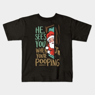 He see's you when you're pooping Kids T-Shirt